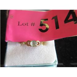 10 KT Yellow Gold and Aquamarine Ring