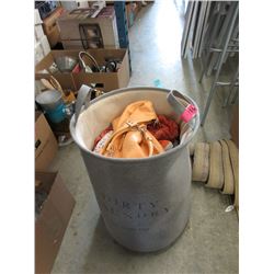 Laundry Basket Filled with Assorted Clothing