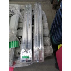 Two 4 Foot Florescent Light Fixtures