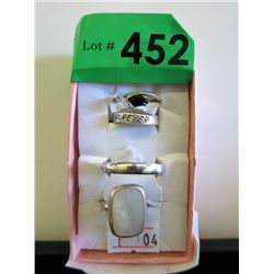 Four Sterling Silver Rings