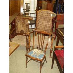 A walnut open armchair and two other chairs...