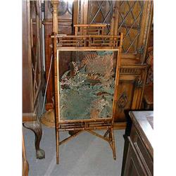 A Victorian bamboo firescreen, H 112cms W 54cms...
