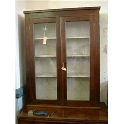 A mahogany enclosed bookcase, H 109cms W 86cms...