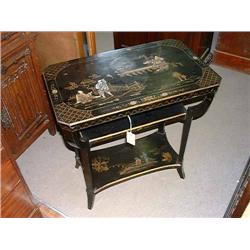 A chinoiserie-decorated and ebonised three-tier occasional table, H 70cms W 65cms...