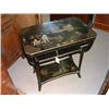 Image 1 : A chinoiserie-decorated and ebonised three-tier occasional table, H 70cms W 65cms...
