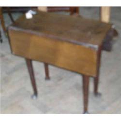 An 18th century mahogany drop-leaf table (modified), H 66cms W 63.5cms...