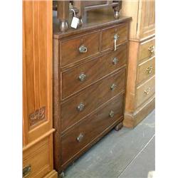 A George IV mahogany chest of five drawers, on turned bun feet, H 107cms W 104cms...