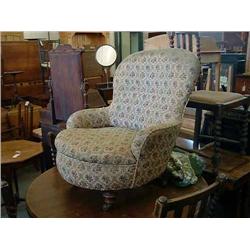 An Edwardian mahogany-framed nursing chair...