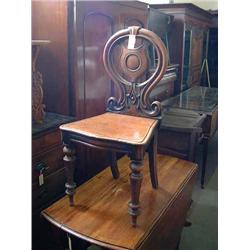 A Victorian mahogany balloon back hall chair, H 89cms...