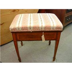 An Edwardian mahogany and satinwood-banded box seat piano stool, and two cane seat chairs...