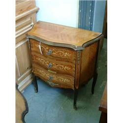 A kingwood and marquetry serpentine chest of three drawers, H 72cms W 69cms...