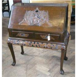 An Oriental carved teak bureau, H 109cms W 108cms...