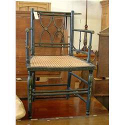 A Regency style painted and floral-decorated elbow chair...