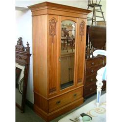 An Edwardian satin walnut wardrobe in the Art Nouveau manner, H 209cms W 121cms...