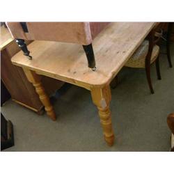 A rectangular pine kitchen table, L 182cms W 83cms...