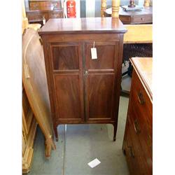 A mahogany music cabinet with compartmentalised interior, H 99cms W 57cms...