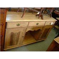 An 18th century style oak low dresser, H 86cms W 153cms...