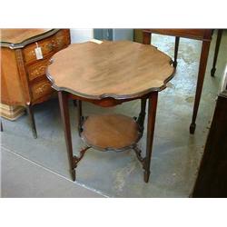 A Victorian mahogany two-tier occasional table, H 68cms Dia 69cms...