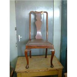 A set of four mahogany Queen Anne style dining chairs...