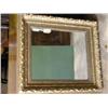 Image 1 : A gilt-framed mirror, 89cms x 79.5cms....
