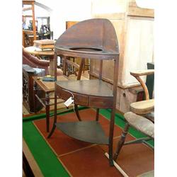A George III mahogany three-tier corner washstand, H 103cms W 57cms...