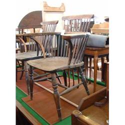 A pair of Victorian ash and elm low stickback Windsor armchairs...