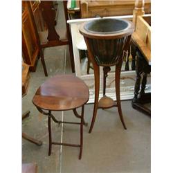 A Victorian mahogany coaching table, Dia 40.5cms; and an Edwardian mahogany jardiniere, (a.f.) H...