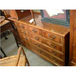 A Georgian style mahogany sideboard, H 76cms W 151cms; and a modern gilt-framed mirror....