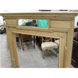 A Victorian pine fireplace surround, having moulded dentil cornice, over inset mirror, H 5f 1in W...