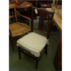 A pair of Edwardian mahogany side chairs...