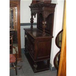 A 19th century carved oak side cabinet H 185cms W 122cms...