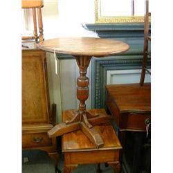 An oak circular top occasional table, H 62cms Dia 55cms...