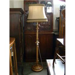 A Victorian style walnut standard lamp, H 180cms...