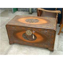 An Eastern carved hardwood blanket chest with camphorwood lining, H 58cms W 105cms...