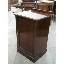 A mahogany bedside cupboard, H 74.5cms W 46cms...