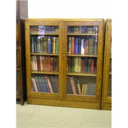 A pair of oak bookcases, H 117cms W 111cms...