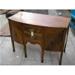 A Georgian style bow-fronted mahogany sideboard, H 81cm W 112.5cm...