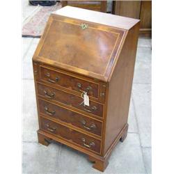 A yew bureau, H 95.5cms W 56.5cms...