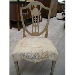 A pair of 19th century Hepplewhite style painted shield-back side chairs (a.f.)....