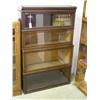 Image 1 : An oak Globe Wernicke style four-section bookcase (base deficient), H 137cms W 87cms...