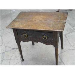 An 18th century oak side table (later carved and modified), H 69cm W 73.5cm...