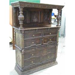 A carved oak side cabinet (made-up), H 182.5cm W 136cm...