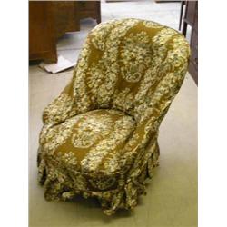 A pair of Victorian tub-shaped easy chairs...