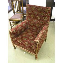 A pair of oak fireside chairs...