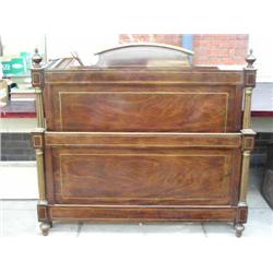 A French Empire style mahogany head and foot bedstead, W 137cms...