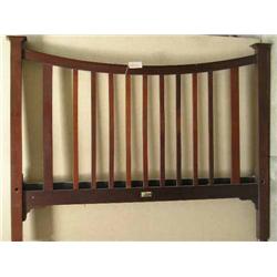 An Edwardian inlaid mahogany head-and-foot bedstead by Maple & Company (modified), W 138.5cms...