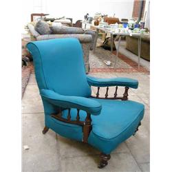 A Victorian carved walnut-framed armchair....