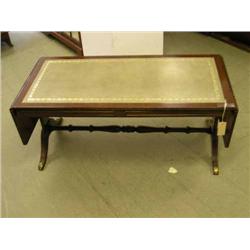 A mahogany drop-leaf coffee table, H 46.5cms L 108cms...