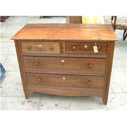 A Continental walnut chest of four drawers (altered), H 82cms W 104cms...