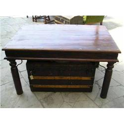 An Indian hardwood table and a cabin trunk, H 77.5cms L 135.5cms and L 91cms...